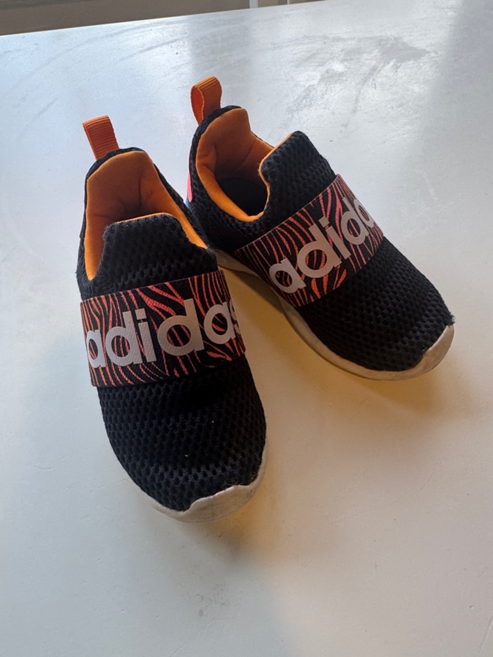 adidas Kids Black Slip-On Sneakers with Orange Accents